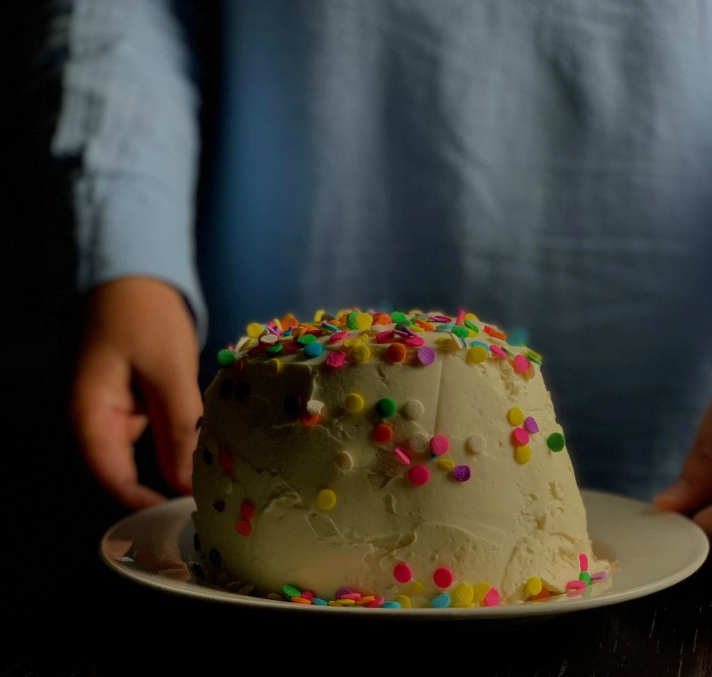 shallow focus photo of cake on white ceramic plate