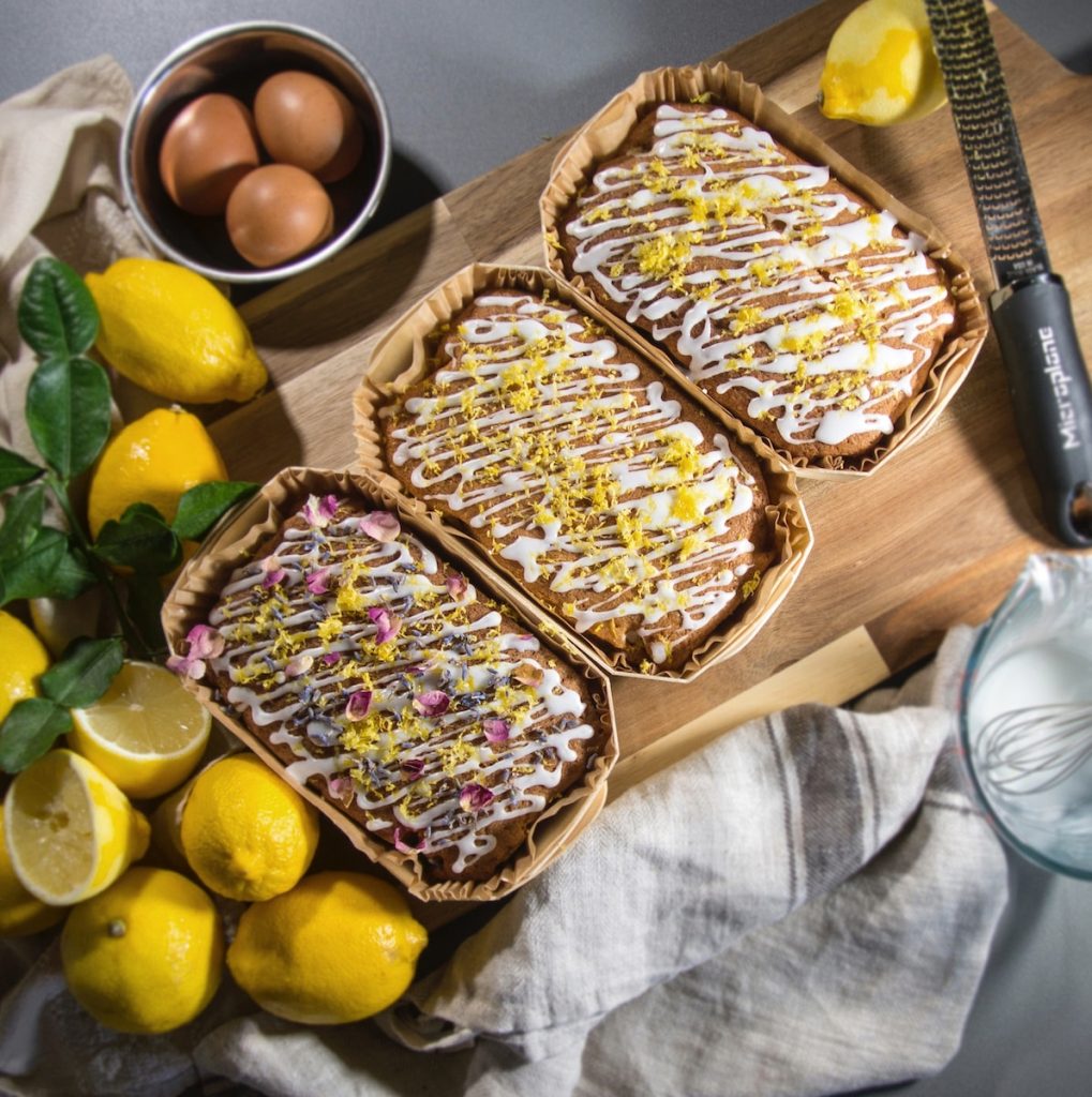 a couple of pies sitting on top of a wooden cutting board